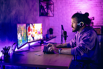 Man gaming over Quantum Fiber